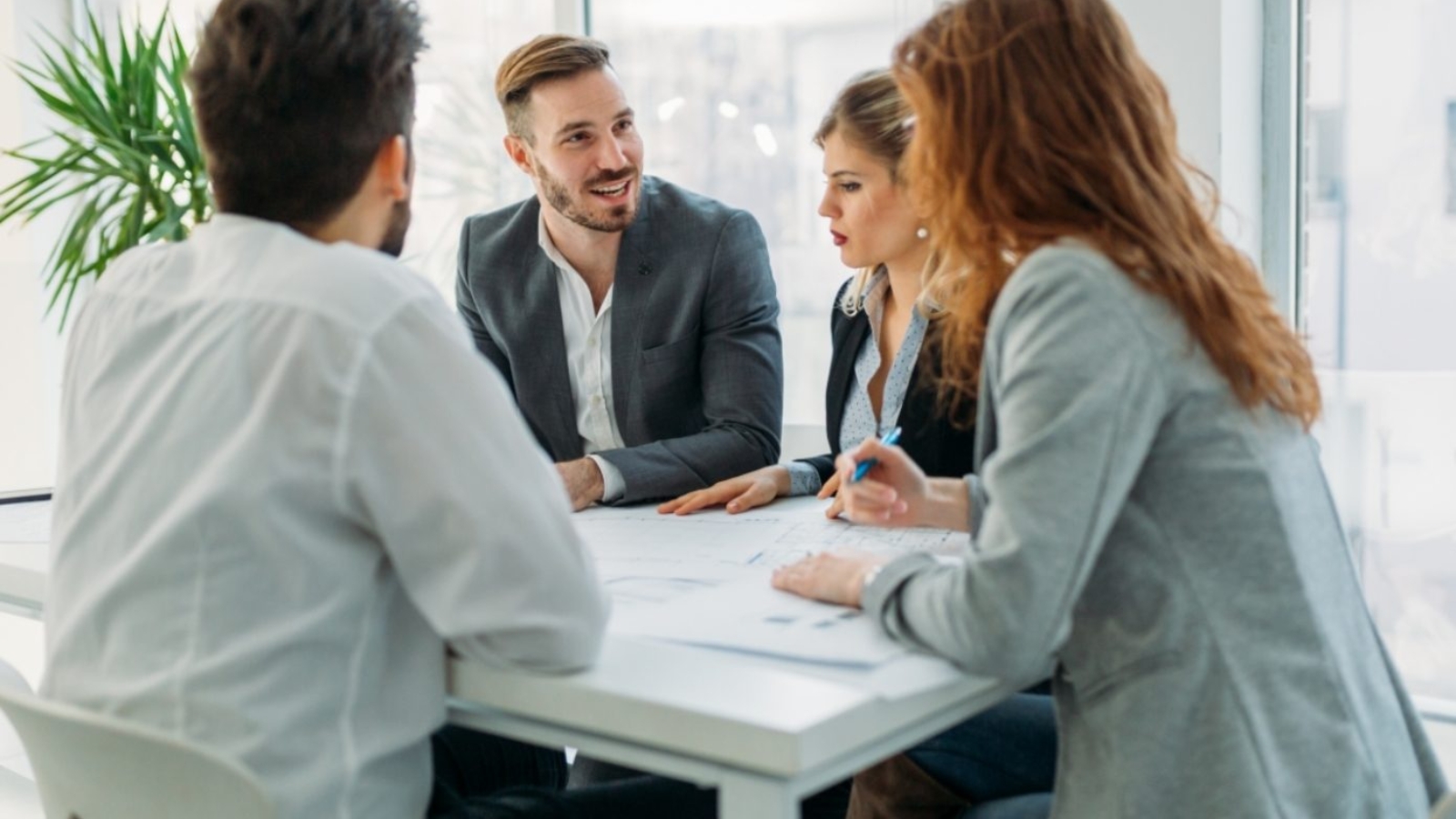 business-people-working-together-on-project-and-5FHSKBL-1390x1042