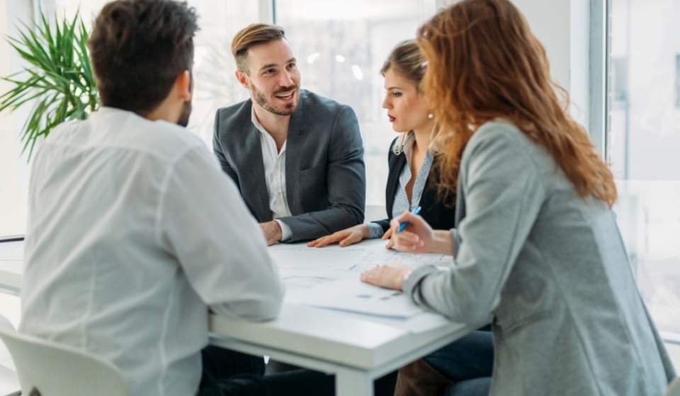 business-people-working-together-on-project-and-5FHSKBL-1390x1042